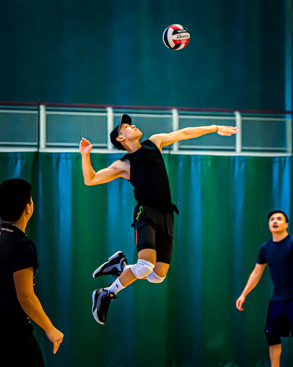Volleyball player executing spike